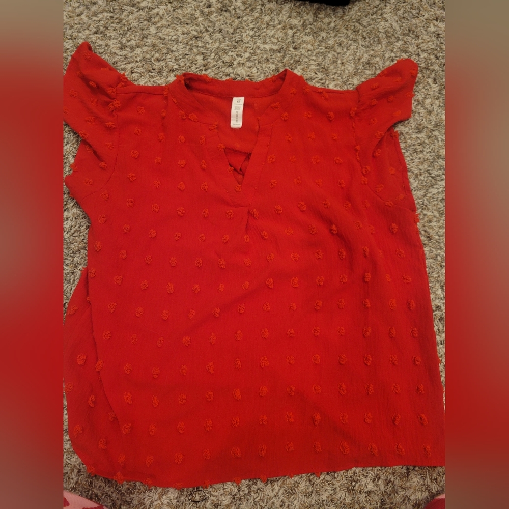Red polka-dot shirt